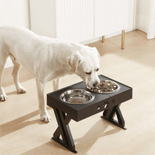 Load image into Gallery viewer, White Labrador dog eating from an adjustable feeding station with dual bowls

